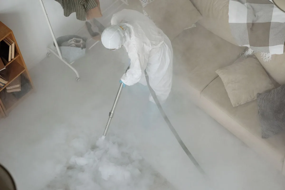 Biohazard cleanup technician in protective equipment, Hopewell, TN